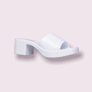 Brand new white rubber mule sandals.
